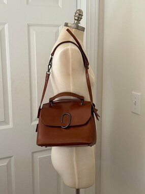 Maison de Beauté Brown leather handbag